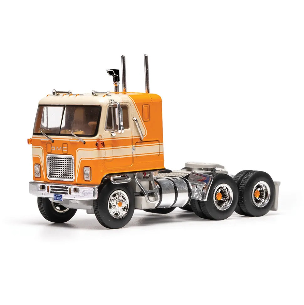 1970 GMC Astro 95 - Orange And White 1:64 Scale Diecast Model Truck by IXO Models