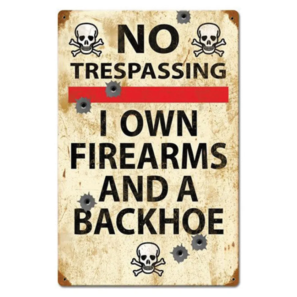 No Trespassing: I Own Firearms and a Backhoe Metal Sign by Vintage Sign Co.