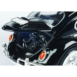 Volkswagen Beetle with Surfboard - Black 1:24 Scale Diecast Model Car by Motormax